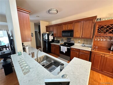 Kitchen featuring light hardwood / wood-style floo