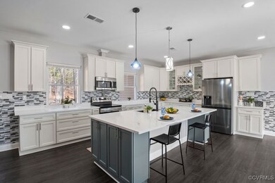 Beautiful kitchen with plenty of recess lighting a