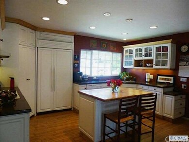 Gas Stove, Built-in Refrigerator and Corian Counte