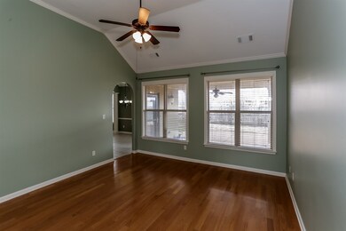 Once again, lovely hardwood flooring, fireplace number 1, and two sets of double windows for an abundance of natural light!