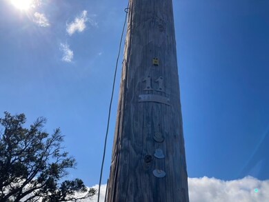 Helco power pole #11 across the street