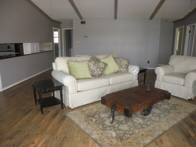 furnished great room with fireplace