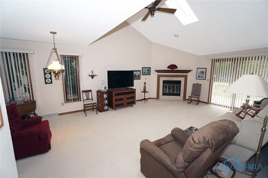 Custom blinds, ceiling fan & skylight