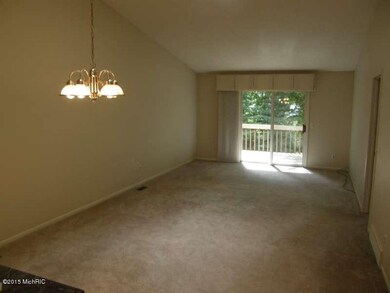 1037 Beechtree Ct unit 36, Norton Shores, MI 49441 - photo 2