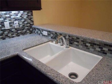 Closer view of the countertop and backsplash detai