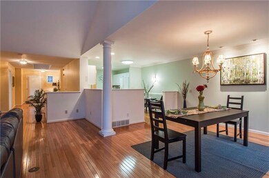 Open floor plan with dramatic interior columns.
