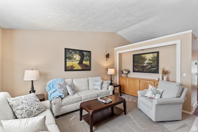 Living room with built-in cabinets and shelf