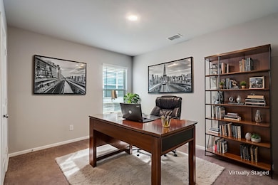 Office featuring carpet flooring and baseboards