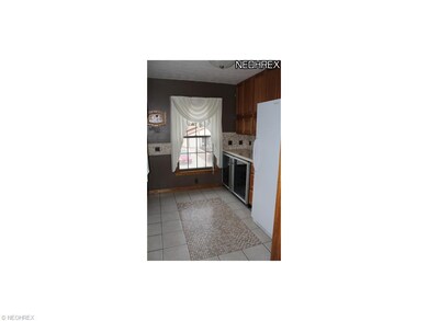 This room is off the kitchen and has an upright fr