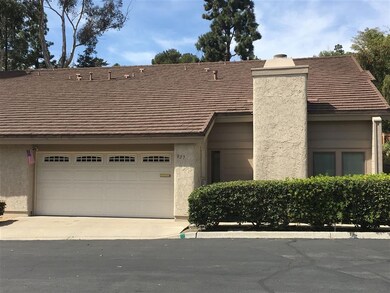 LARGE 2-car garage with custom cabinets and storag