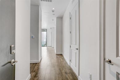 The foyer offers a welcoming entry into the home,