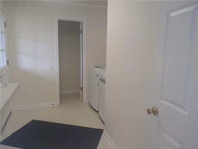 Laundry room with half bath