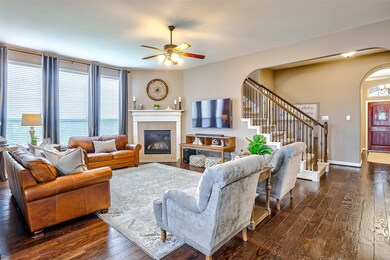 Step inside and you will fall in love with the gorgeous details of this home! With arches welcoming you from one room to the next, and an intricately decorated fireplace, you are sure to want to settle in.