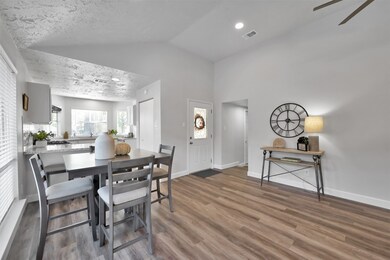 As you enter the home, you will notice there is luxury vinyl plank flooring.  Recessed LED lighting and a ceiling fan were added to the kitchen/dining/living areas.  The walls and ceiling were painted in a neutral color to accommodate any decor.