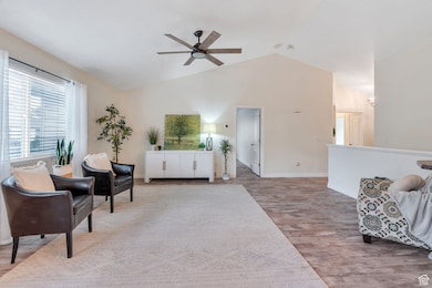 Gorgeous living area with soaring ceilings!