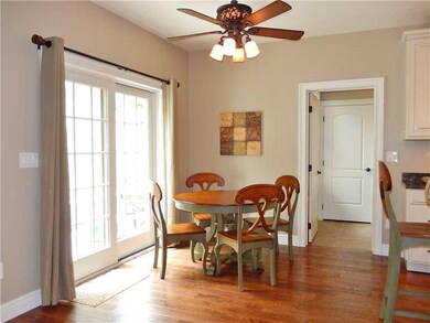 Kitchen. Breakfast nook with slider with slider to