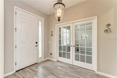 Front entry and double French doors to flex room c