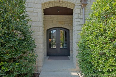 Elegant and stately, the custom arched doors welco