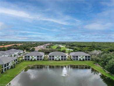 Aerial perspective of suburban area with a nearby body of water