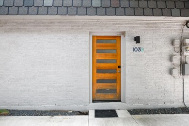 Property entrance with brick siding