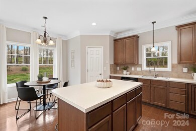 Entertain in your lovely kitchen with island, eating area, and walk in pantry