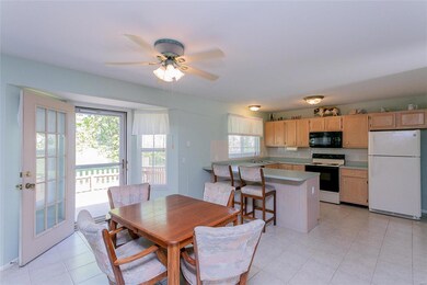 Breakfast room and kitchen with tile floors opens 