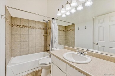 Some updates in this full bath with vaulted ceiling.