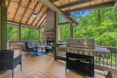 Vaulted ceiling and stacked stone fireplace