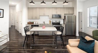 Kitchen with appliances with stainless steel finis