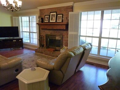 Open Great Room with Brick Fireplace & Great Views