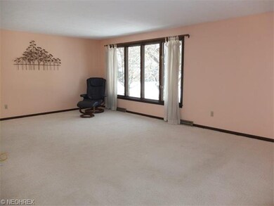 Spacious living room with picture window.