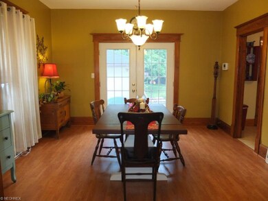 Formal dining room with French doors to back patio