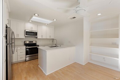 Built in book case in dinning area looking into ki