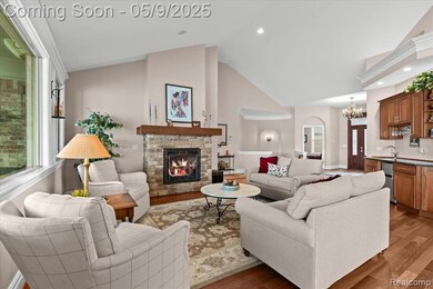 Great room with cozy stone fireplace.