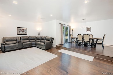 Featuring a recently opened desirable layout and hardwood flooring throughout the entry level.