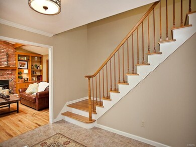 Large welcome foyer opens to family room and livin