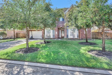 A street view of your new home. Look at these gorgeous mature trees giving you a little privacy, a little shade, and a whole lot of natural beauty.