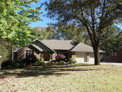 Professionally landscaped, mature trees in front & back yard.
