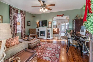 Open to the kitchen.  Fireplace is no longer there