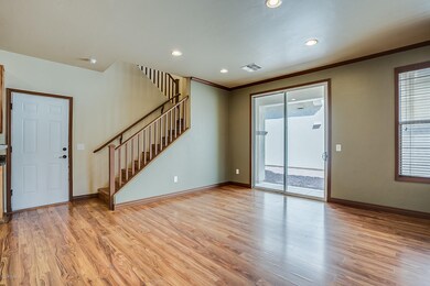 Door to Garage. Slider to Yard.