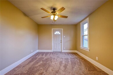 First floor living room, newly installed carpeting