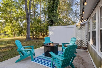 View of patio / terrace with a fire pit