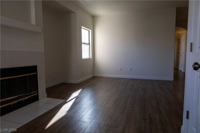 Family room has a gas fireplace and plenty of natu