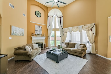 Huge Family Room with floor to ceiling window to l