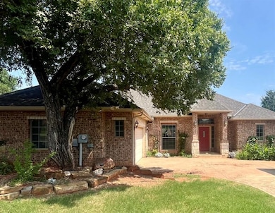View of front of property featuring a garage