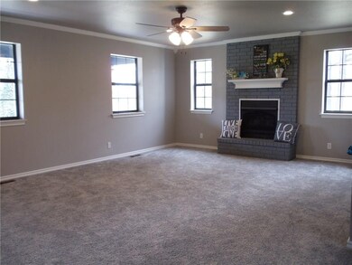 Another view of living room with lots of natural l