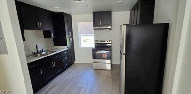 Kitchen with appliances with stainless steel finis
