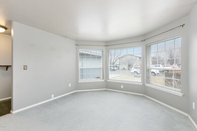 3 Formal Living Room with Large Bay Wind