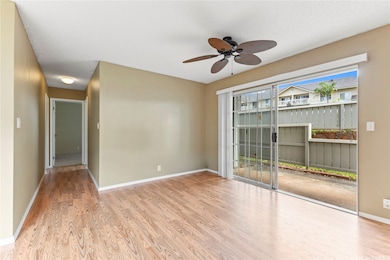 Natural light pours into the living room through s