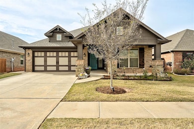 View of front of house featuring a garage and a fr